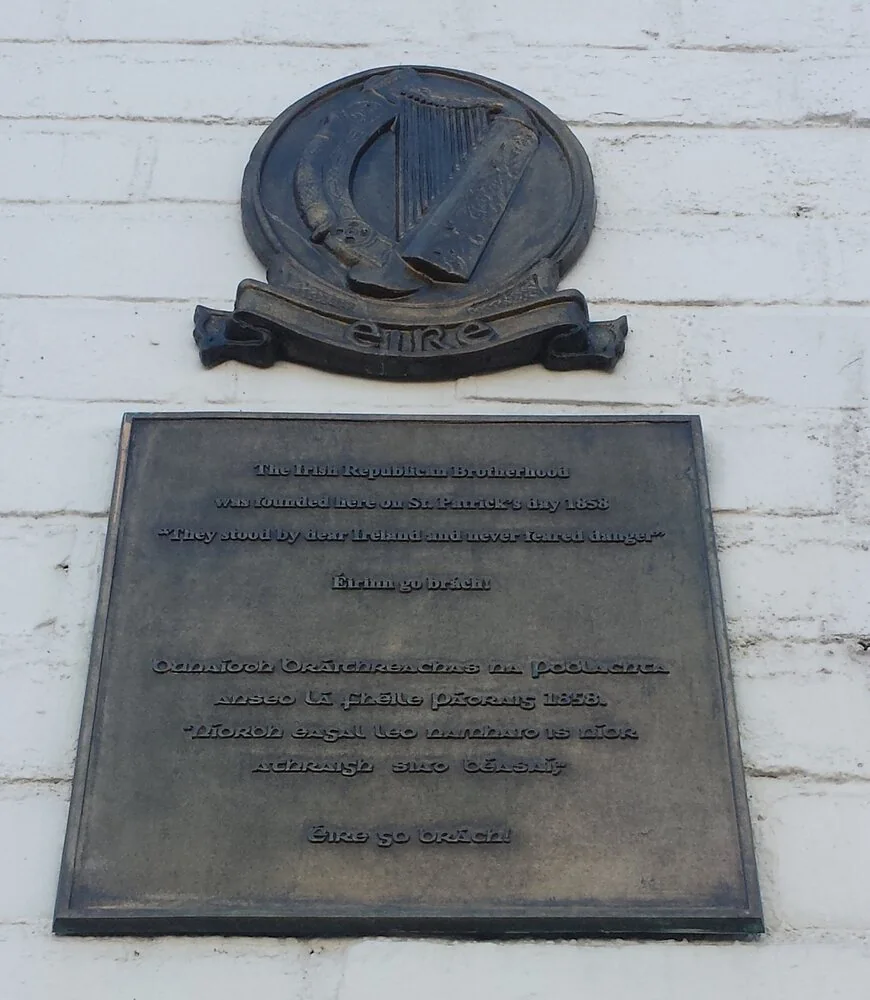 Plaque commemorating site of founding of Irish Republican Brotherhood — later memorial or aftermath visual. Shown from the cited image source.